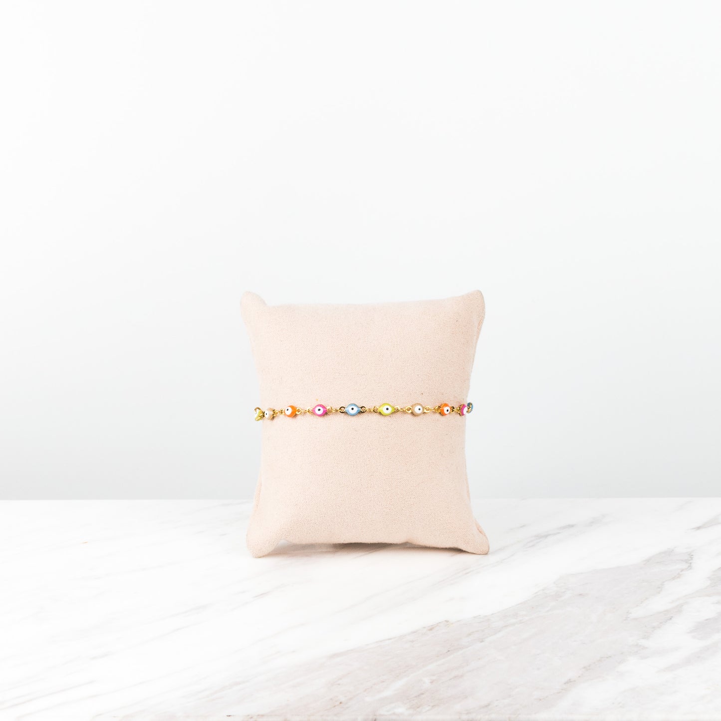 Pastel neon evil eye