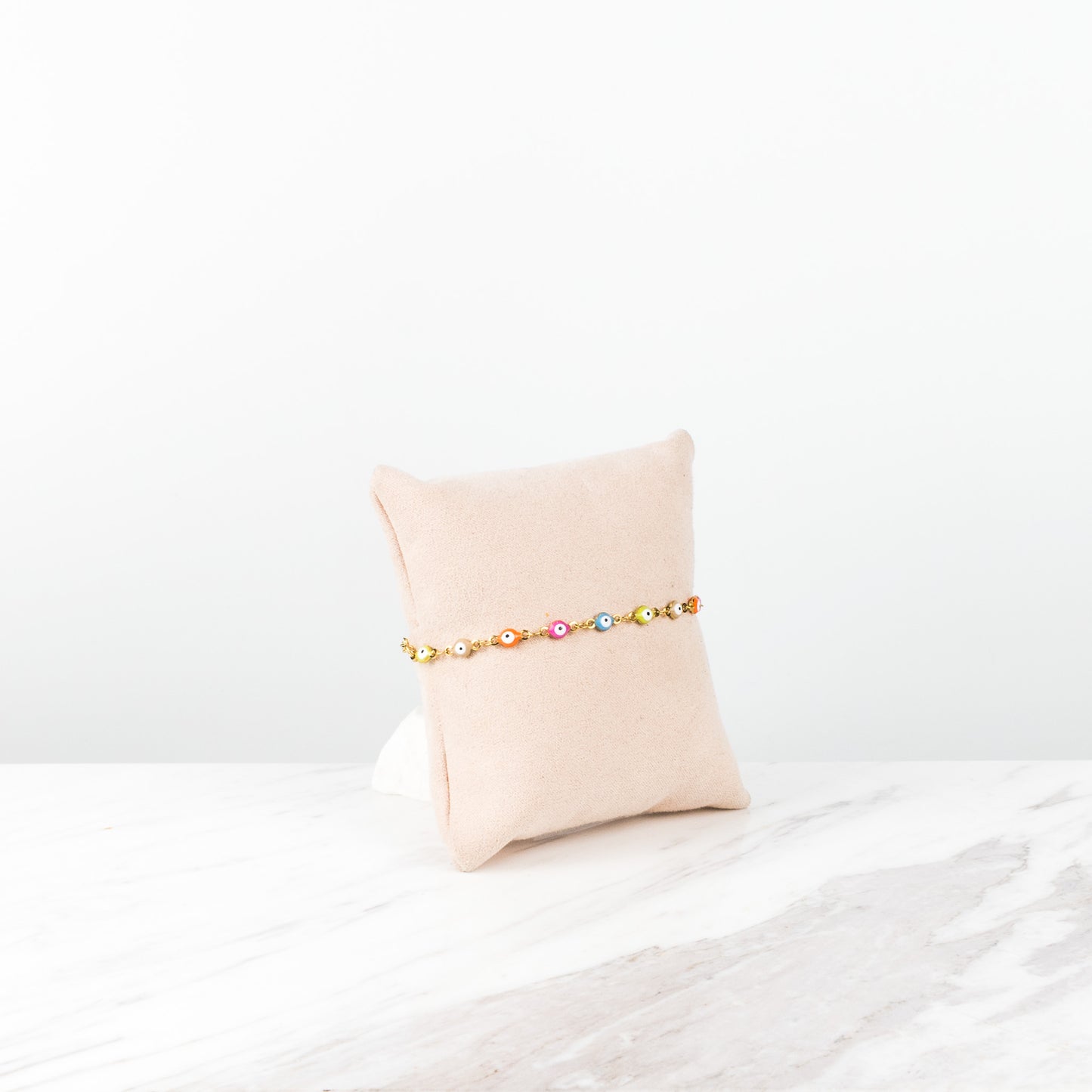 Pastel neon evil eye
