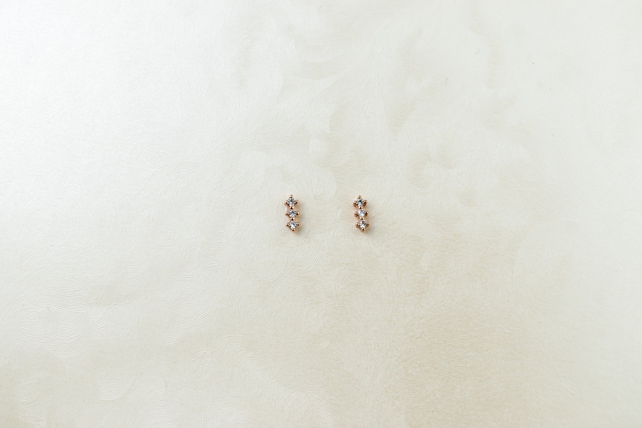 3 rombos de zirconia rose gold