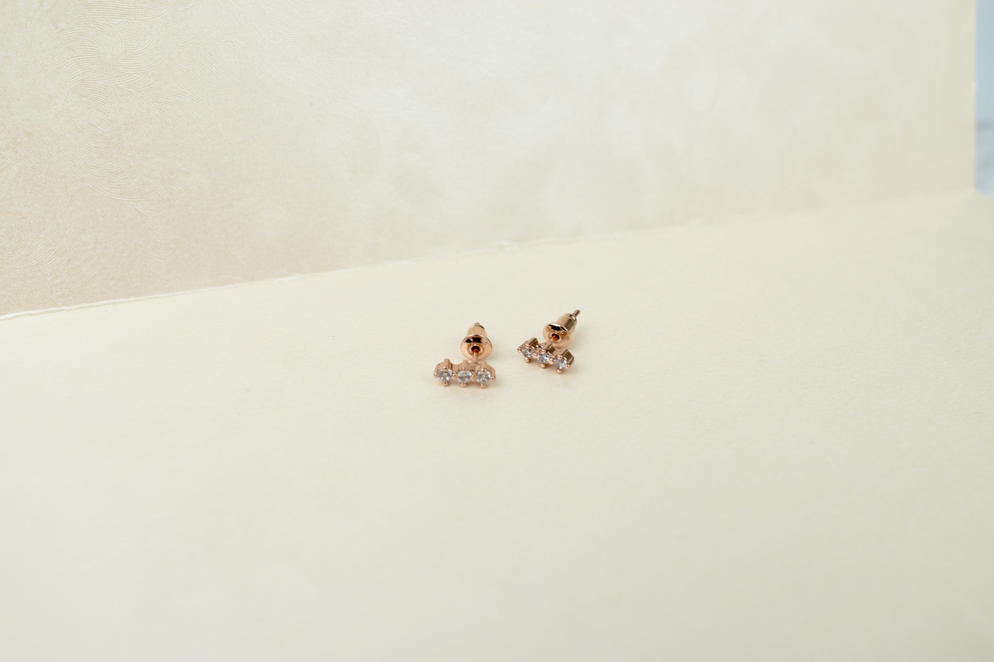 3 rombos de zirconia rose gold