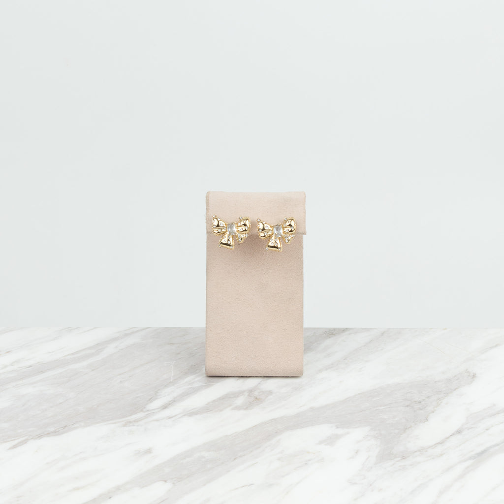 Moño con cristales dorada