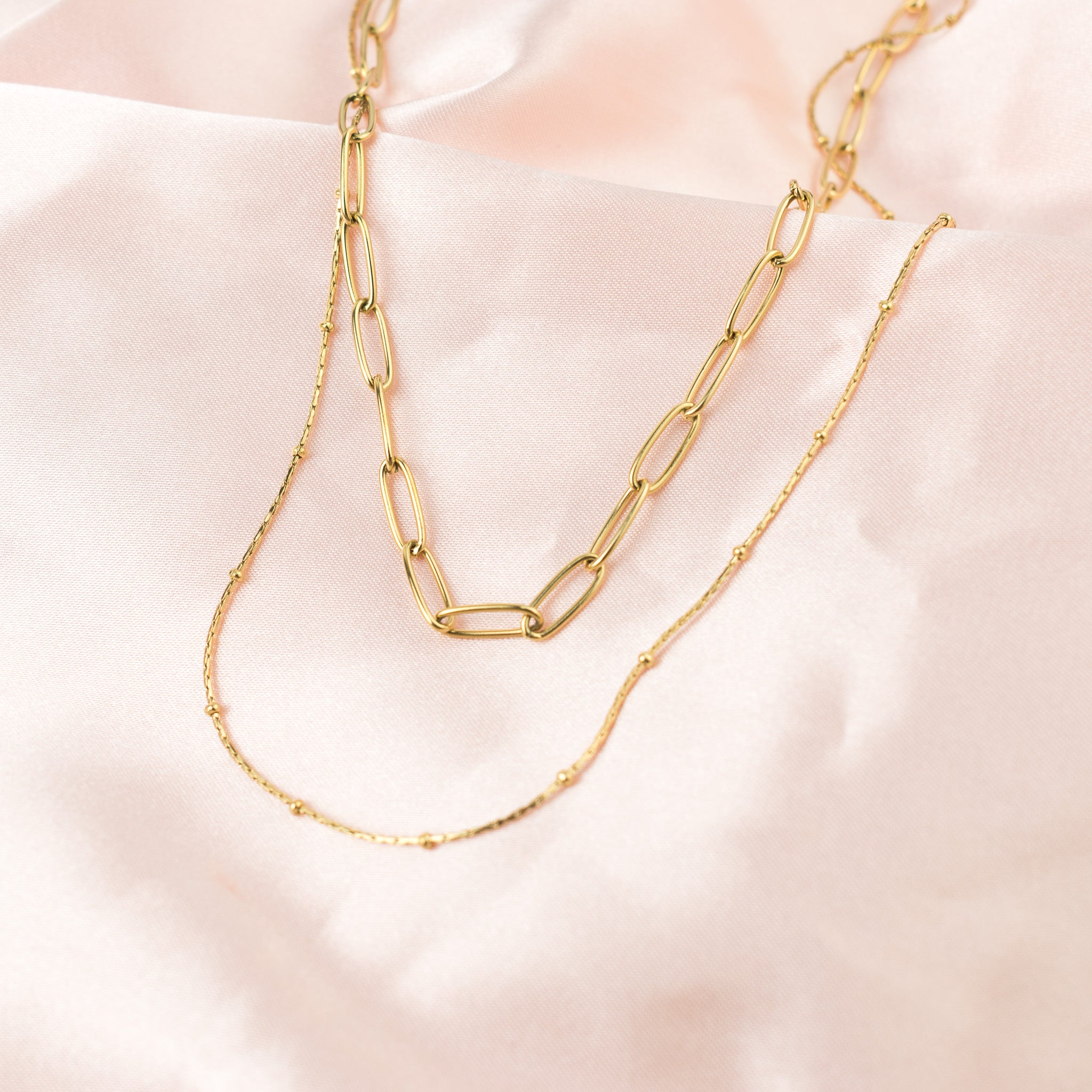 Collar doble con eslabones dorado