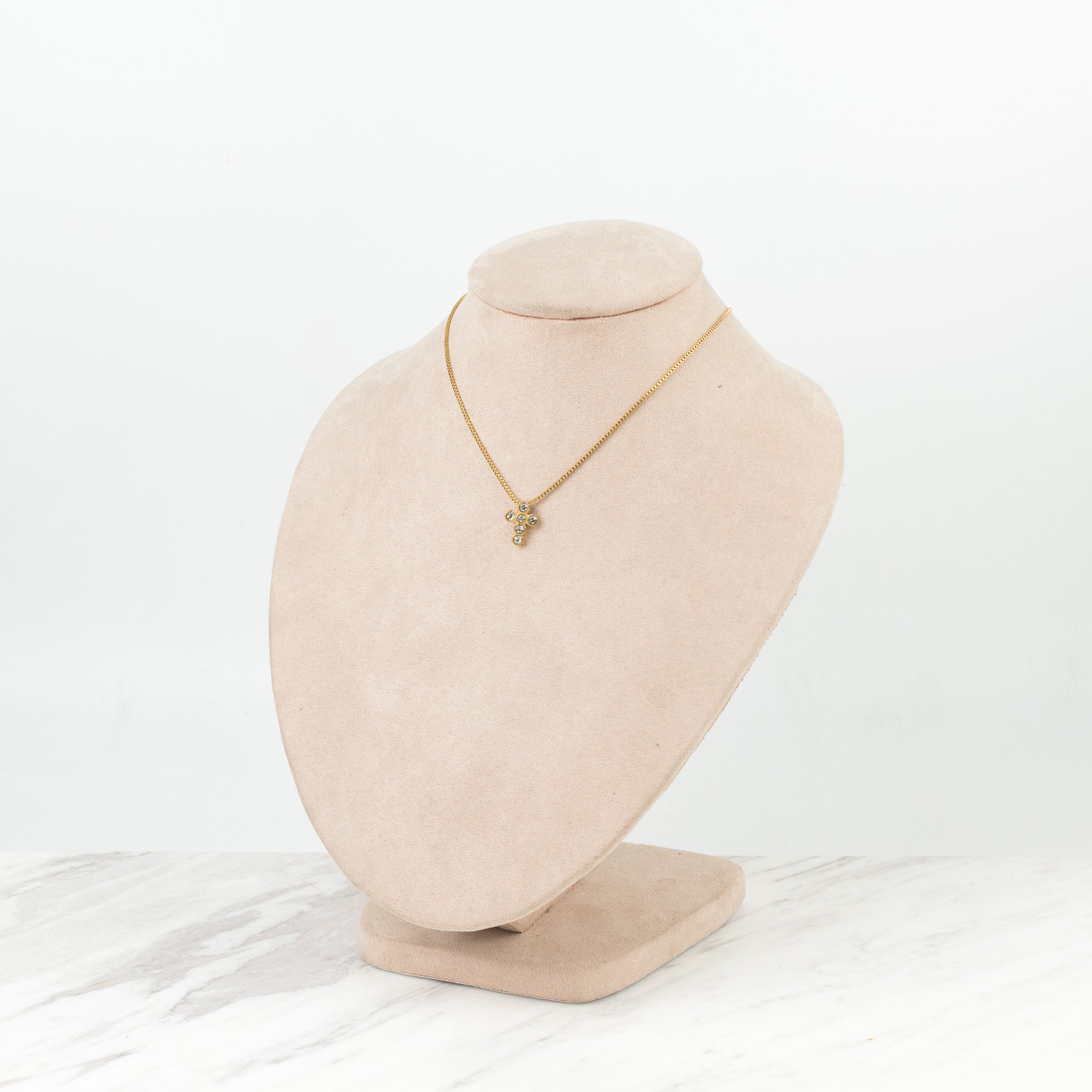 Cruz de círculos dorado