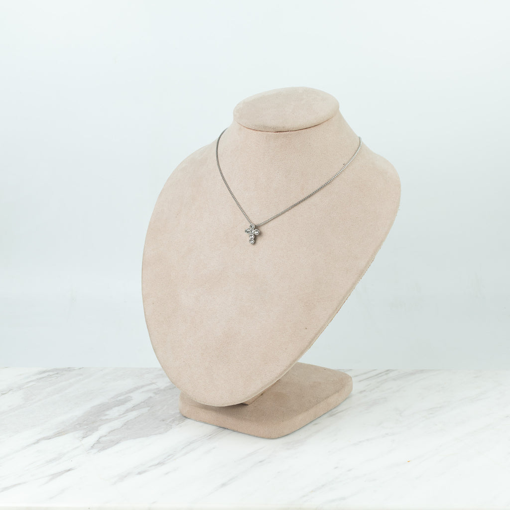 Cruz de círculos plateada