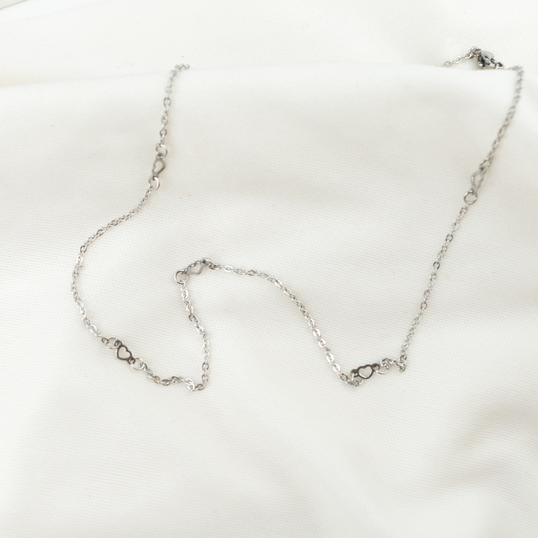 Collar con corazoncito plateado