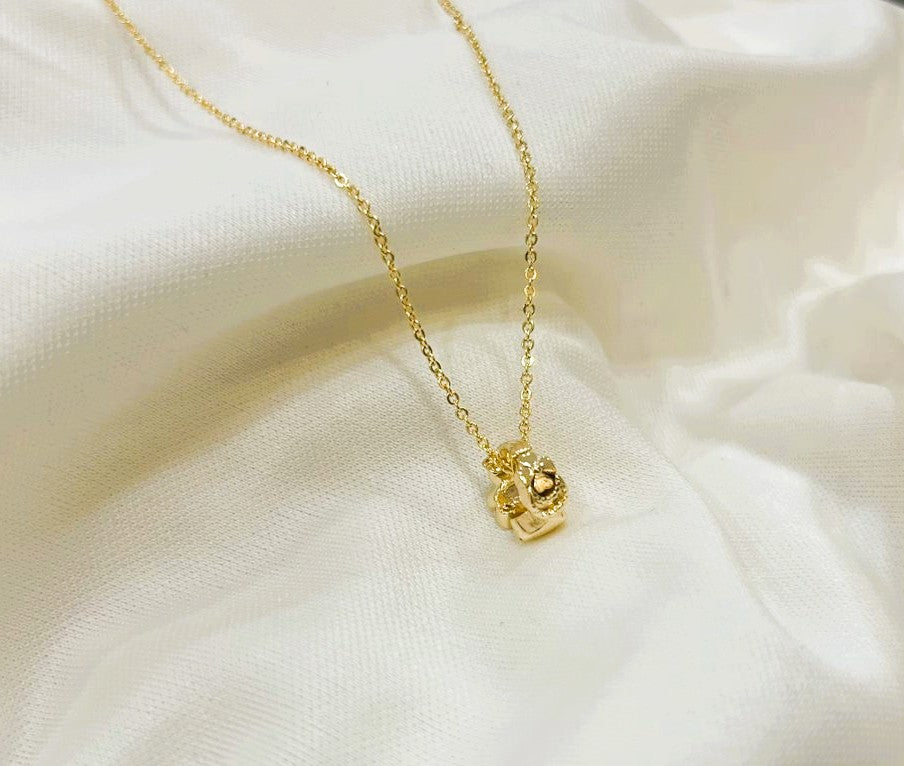 Dije de corazón, sol y estrellas