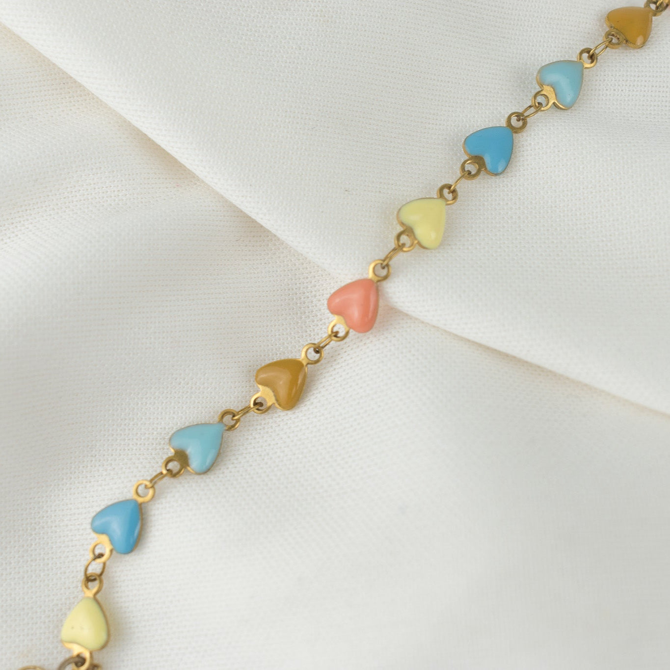 Pulsera corazones salmon