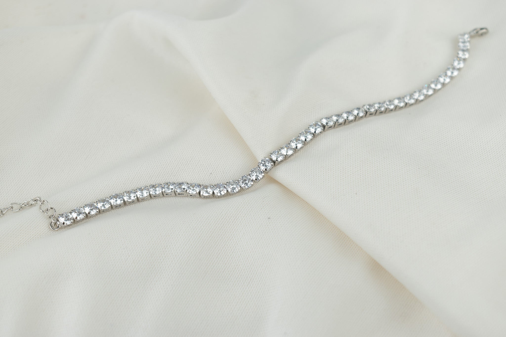 circular silver tennis bracelet