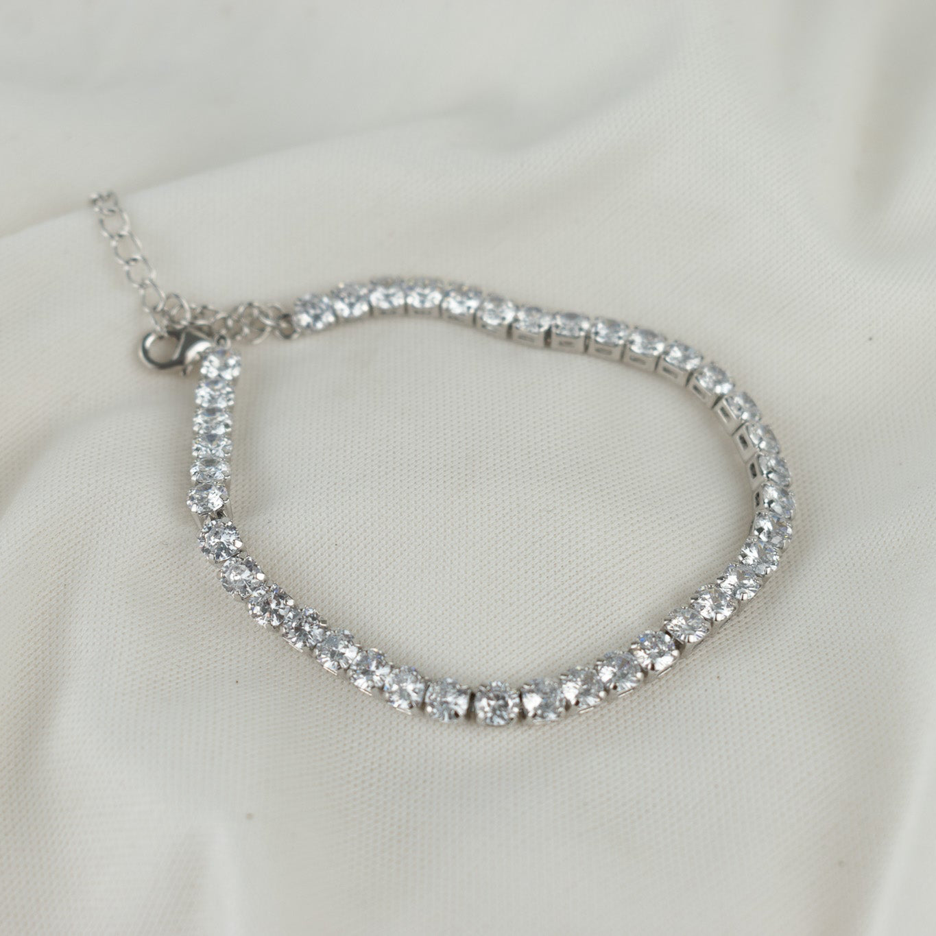 circular silver tennis bracelet
