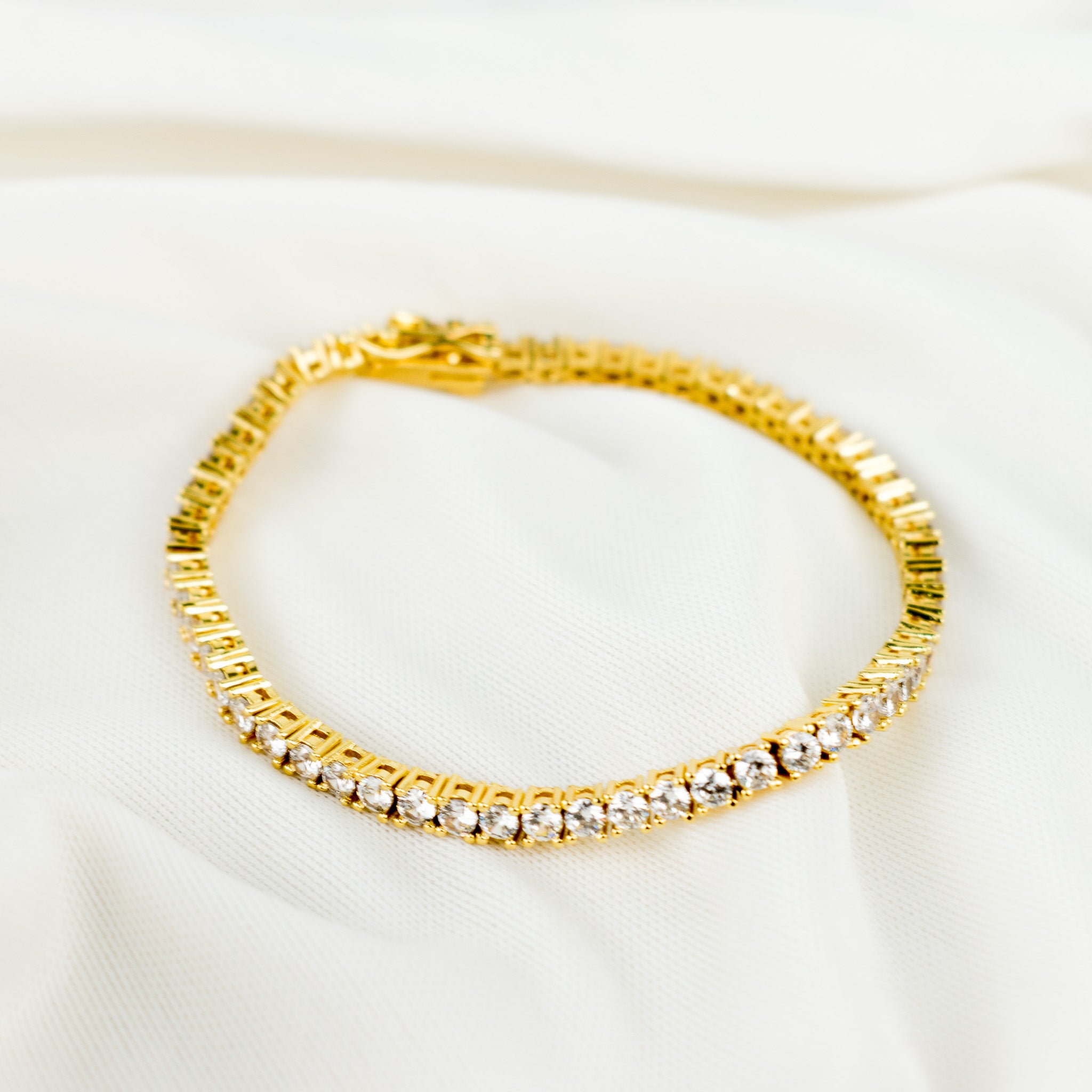 Golden 8 in tennis bracelet