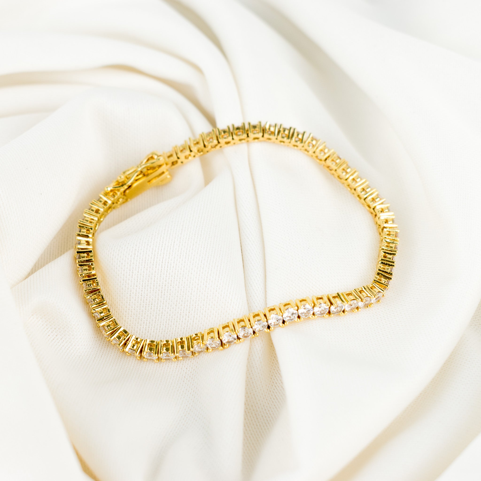 Golden 8 in tennis bracelet