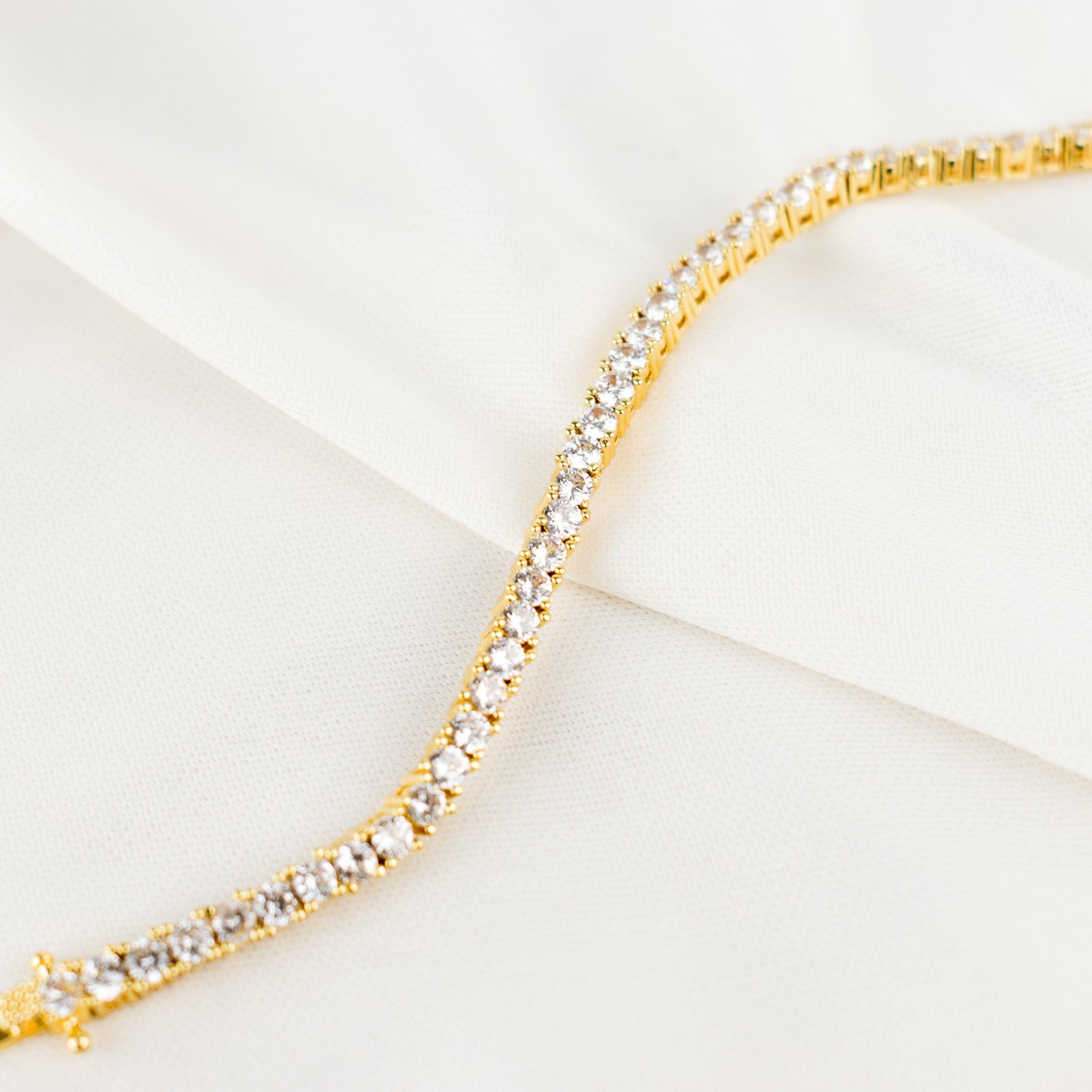 Golden 8 in tennis bracelet