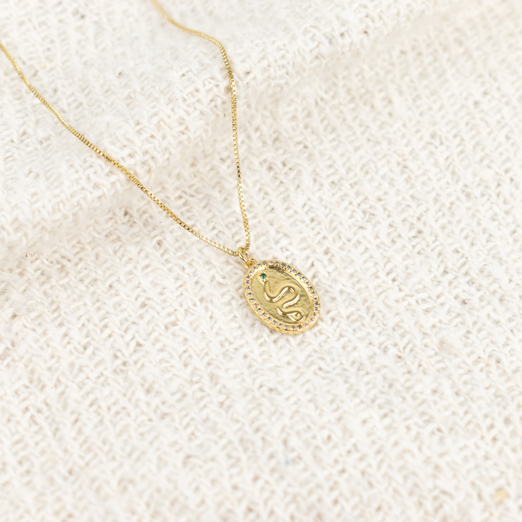 Green snake circle necklace