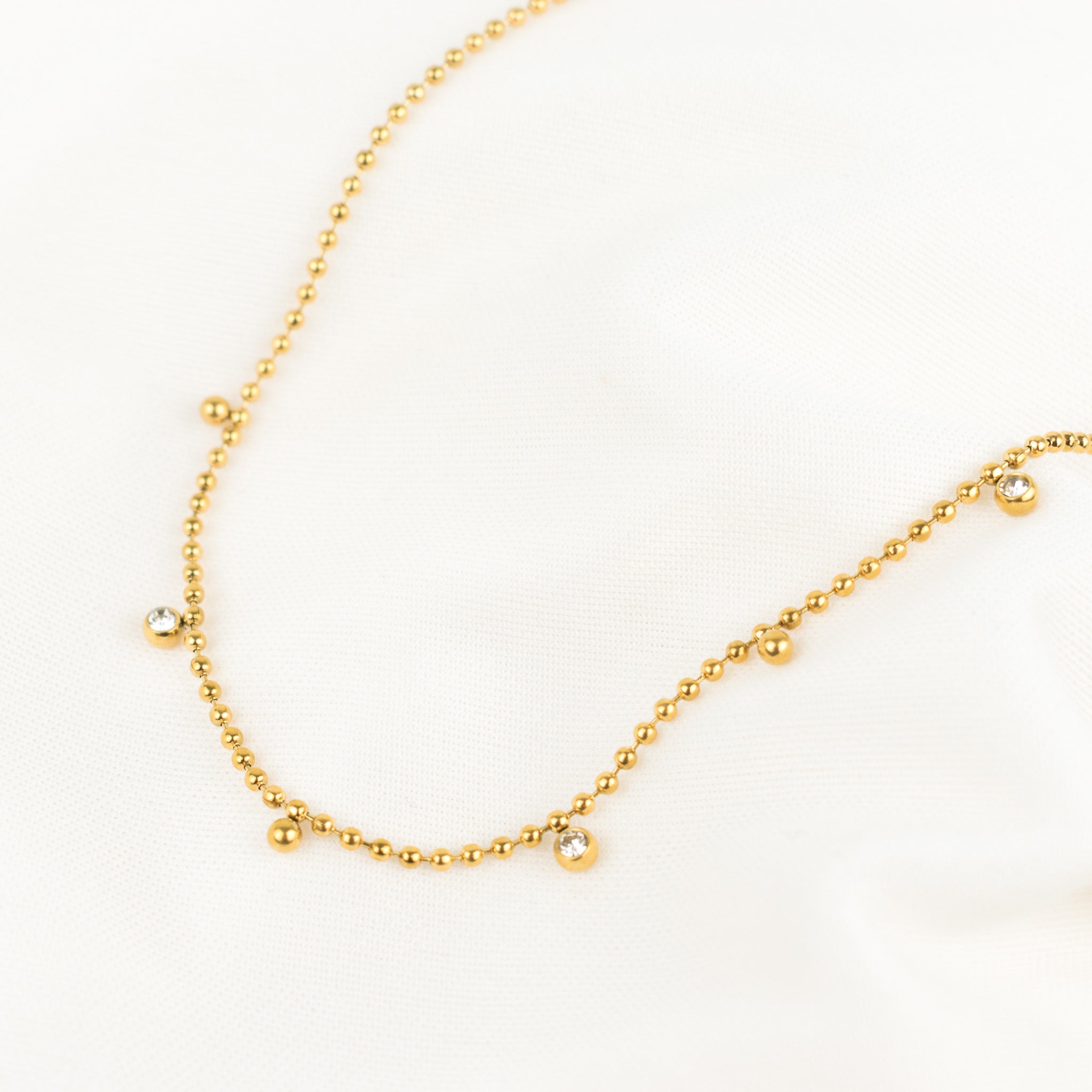 Mitad bolitas Mitad zirconias