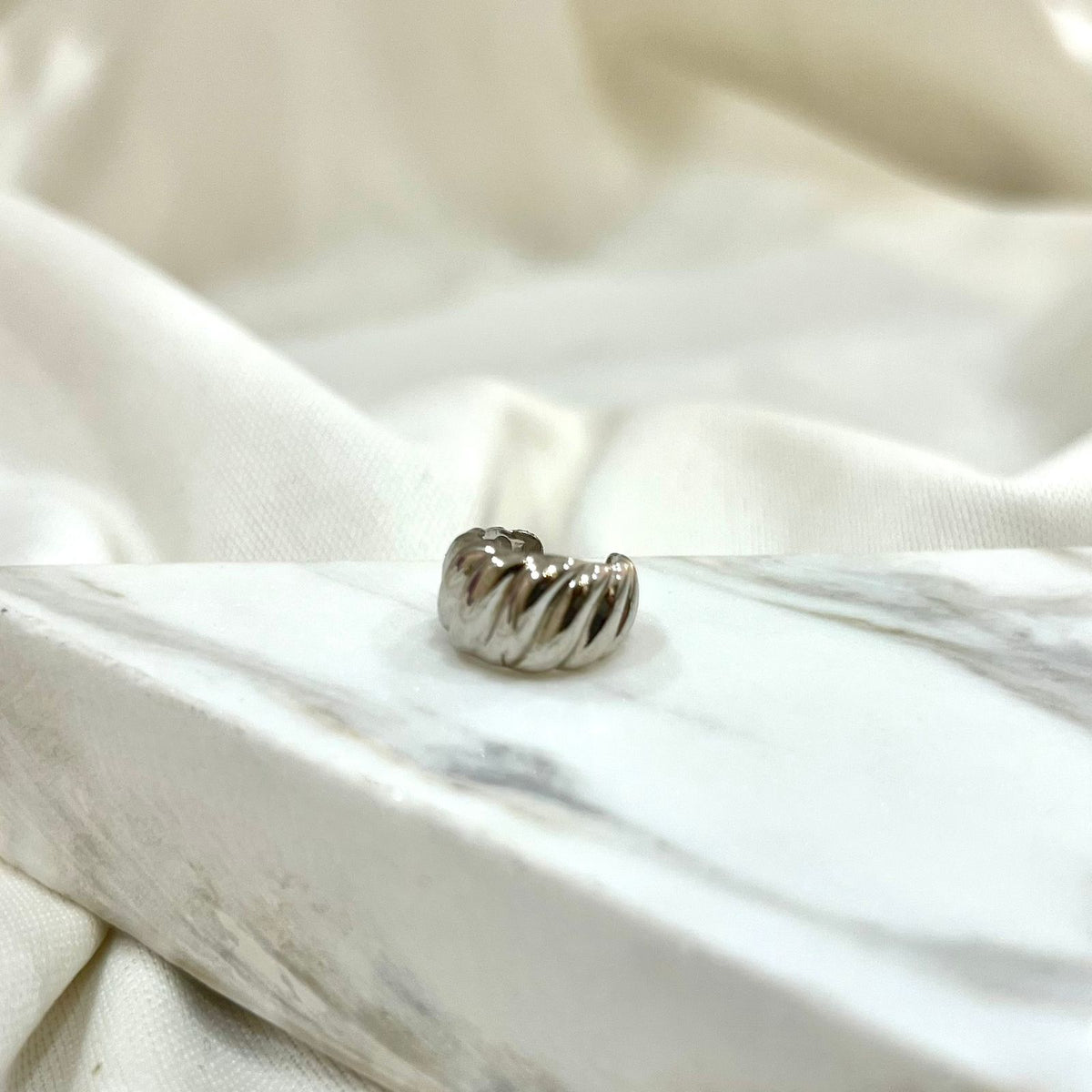 Silver crossaint earcuff