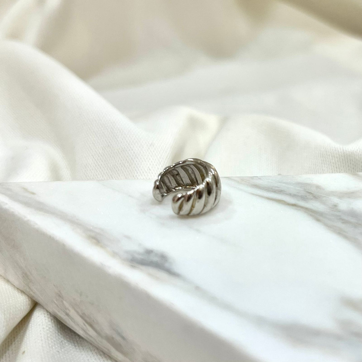 Silver crossaint earcuff