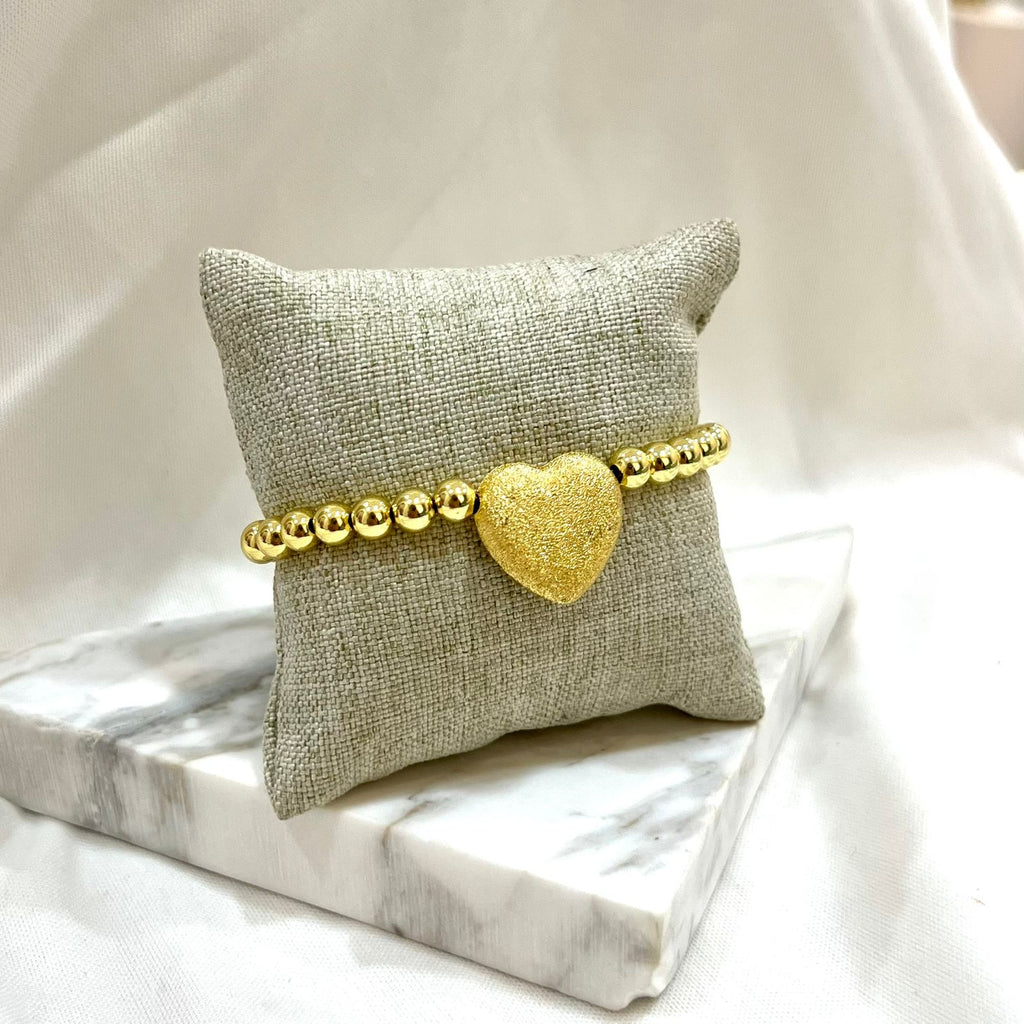 Pursers con bolitas y corazón chunky dorado