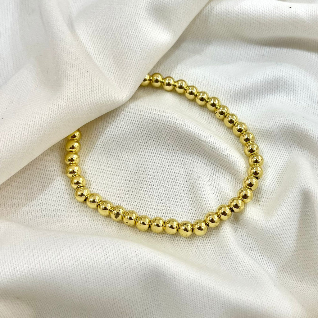 Pulsera dorada con bola N5
