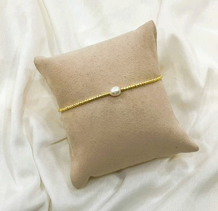 Pulsera Perla de Río Singular en Chapa de Oro