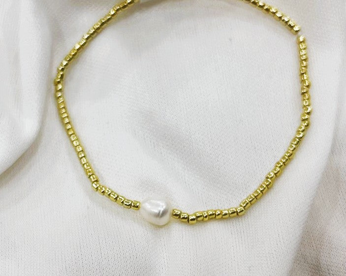 Pulsera Perla de Río Singular en Chapa de Oro